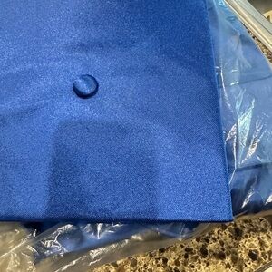 Herff Jones cap and gown